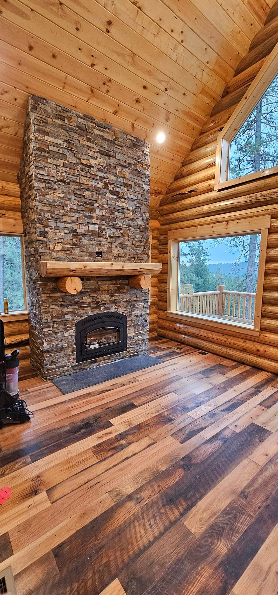 Stone fireplace in log home